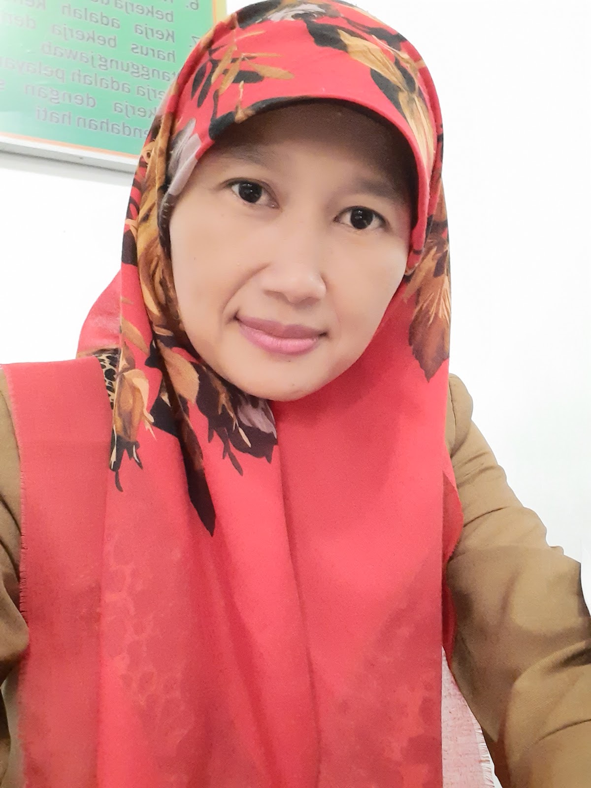Sartika Dewi, S.Pd